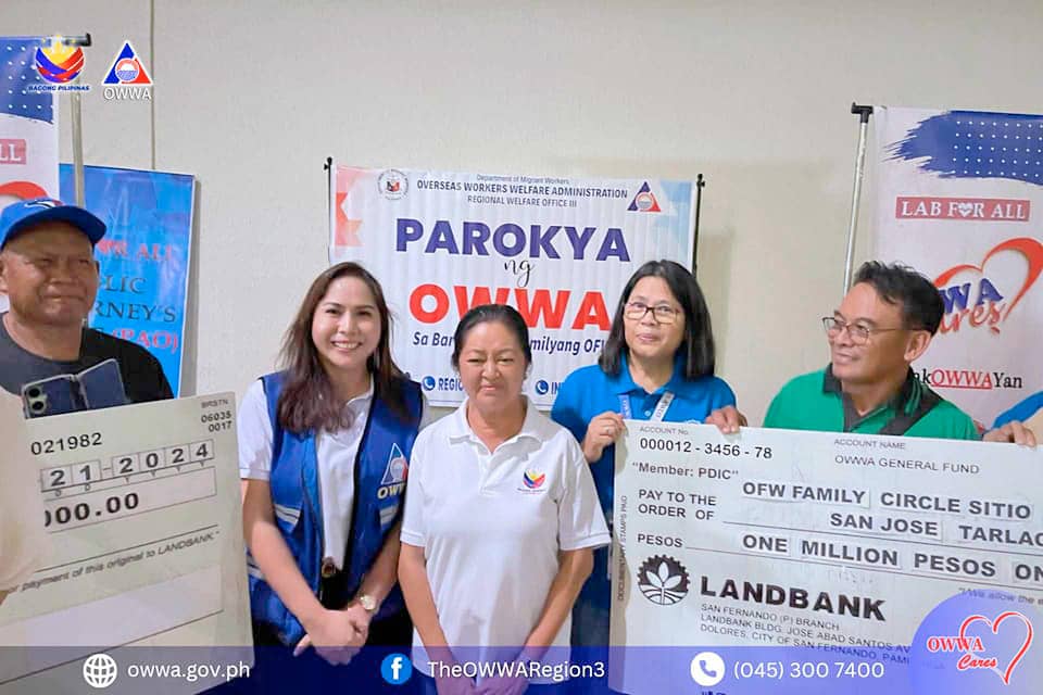 FIRST Lady Liza Araneta-Marcos (center) and Overseas Workers Welfare Administration (OWWA) Deputy Administrator Mary Melanie Quiño (2nd from left) with representatives of Gilas Bitas Farmers Association and OFW Family Circle Sitio Santa Cruz, San Jose, Tarlac, both beneficiaries of a P1-million Tulong PUSO Livelihood Grant from OWWA.
